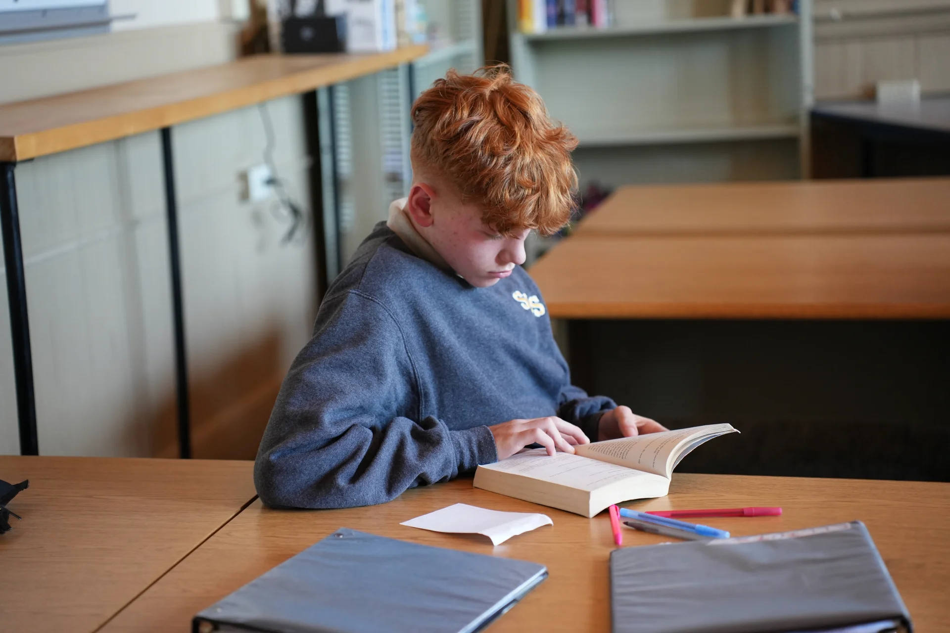 St. Lawrence student reading