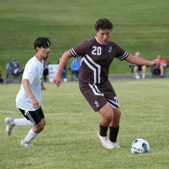 students playing soccer