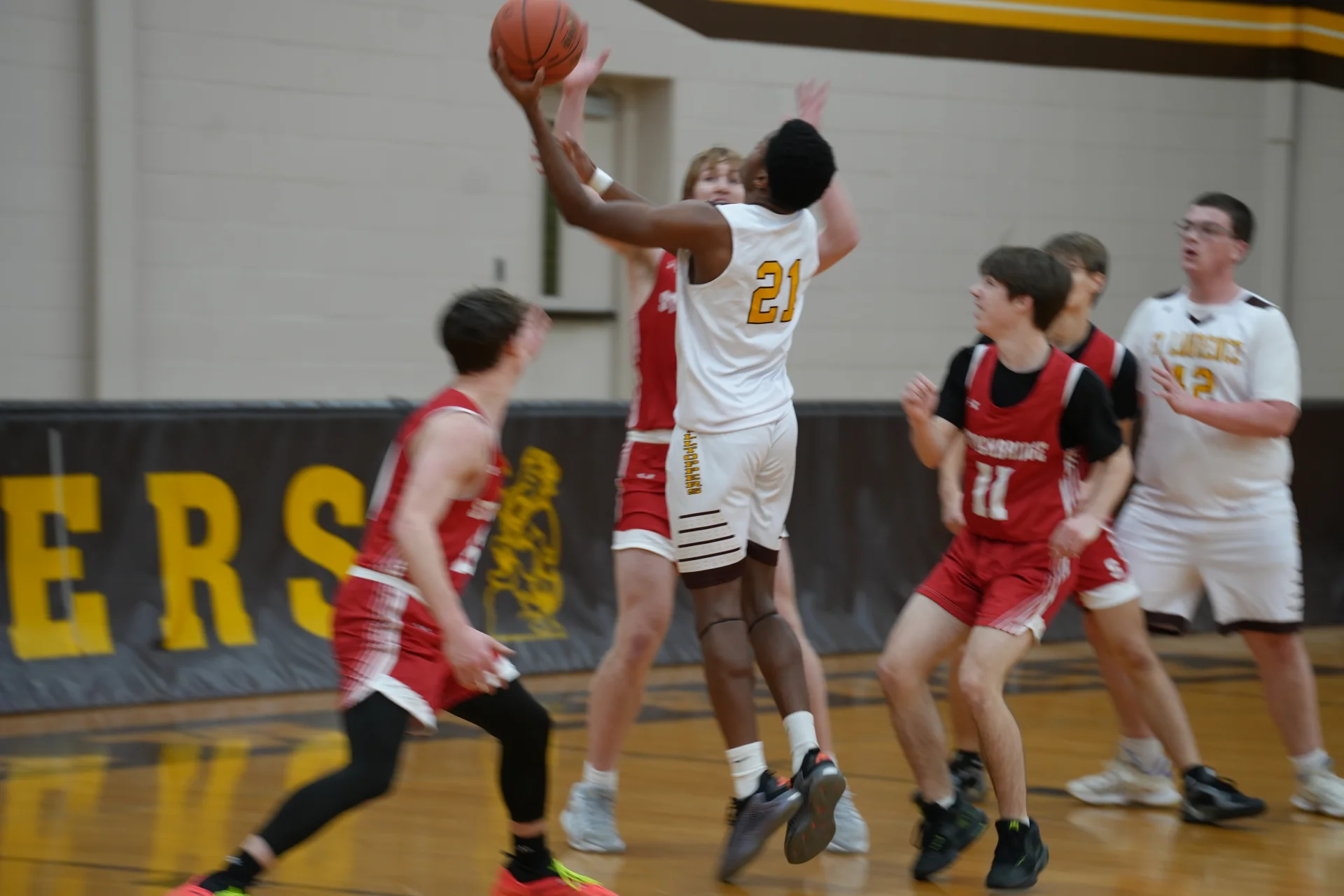 SLS basketball team on the court