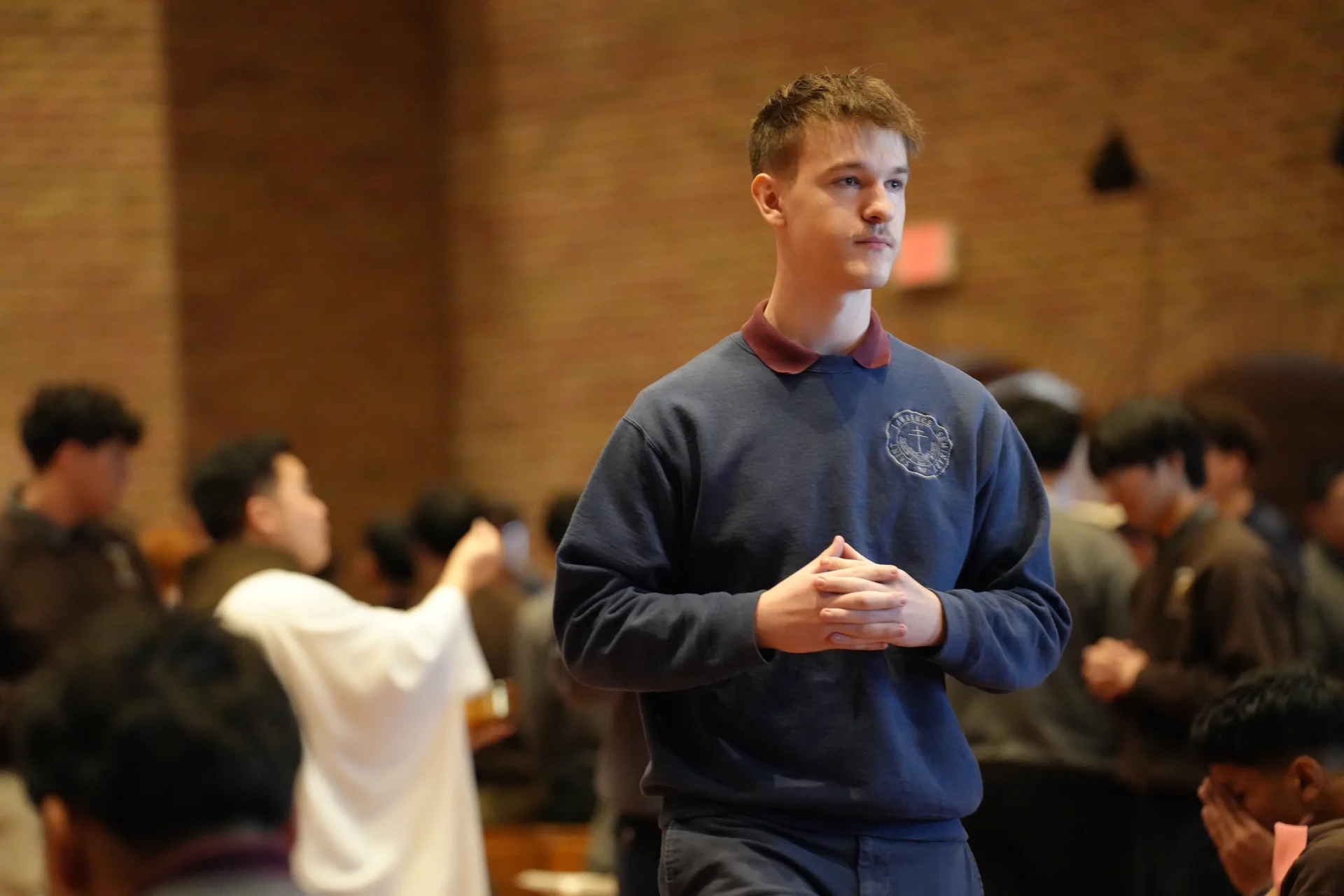 St. Lawrence student at Mass